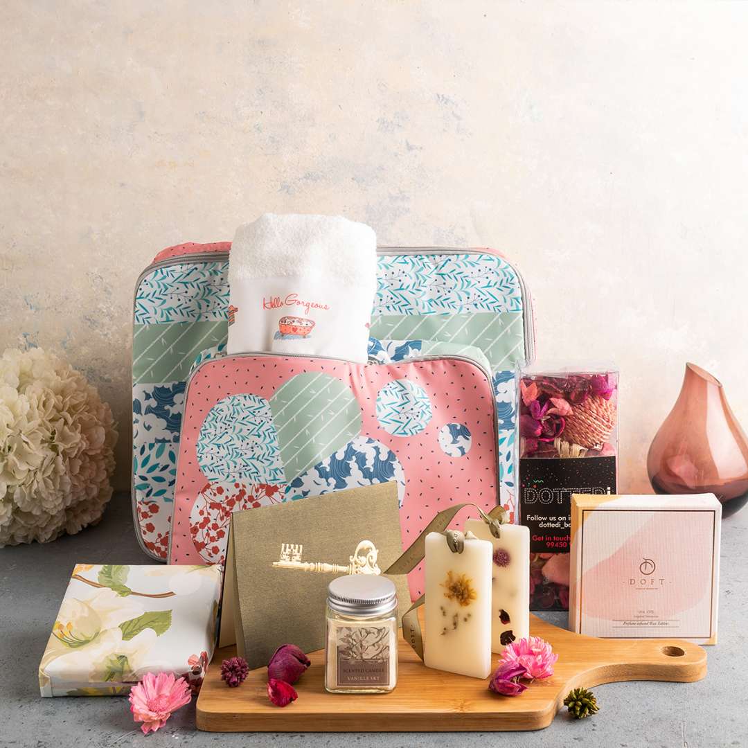 Gift hamper set with pouch candle and self care items