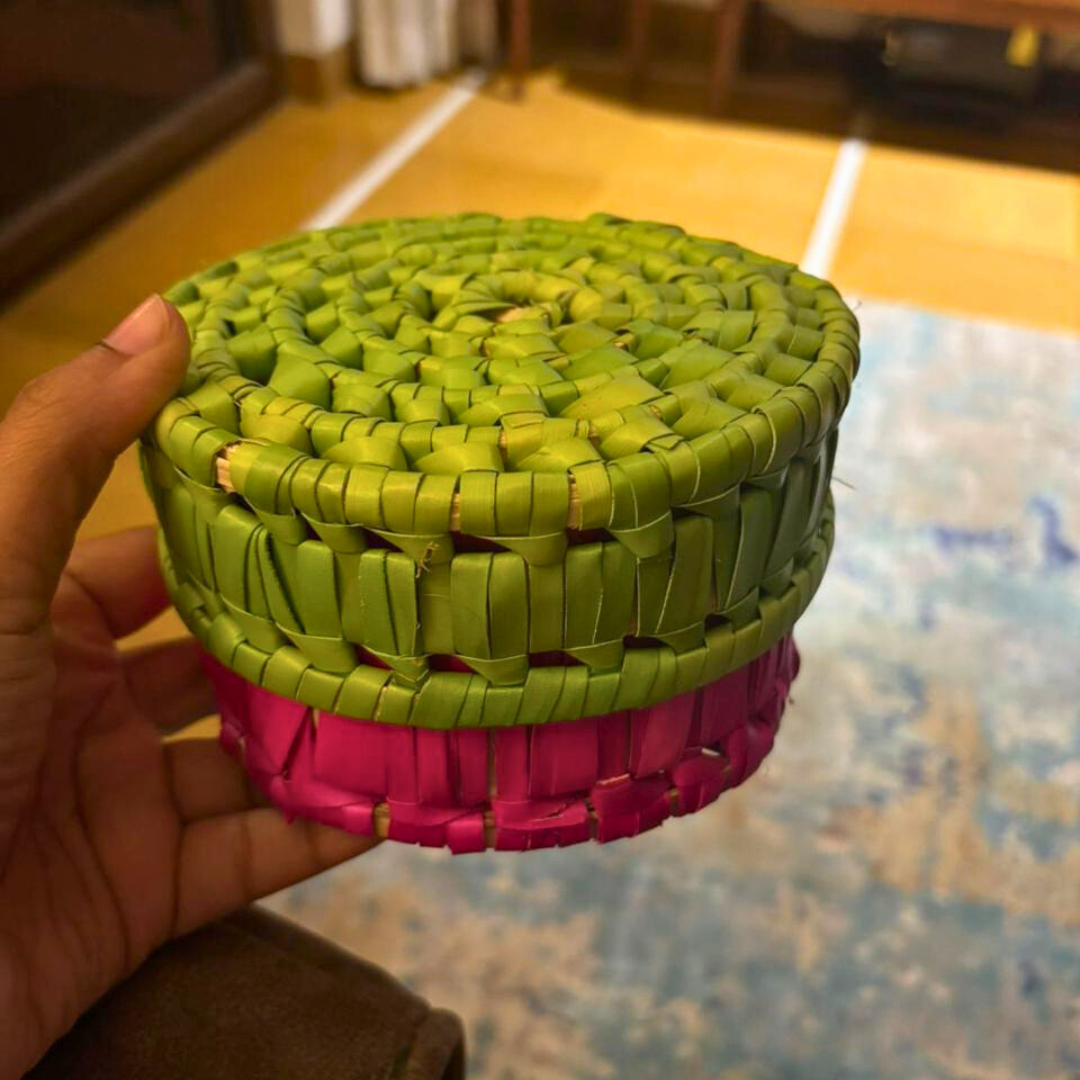 Handwoven green and pink gift hamper basket