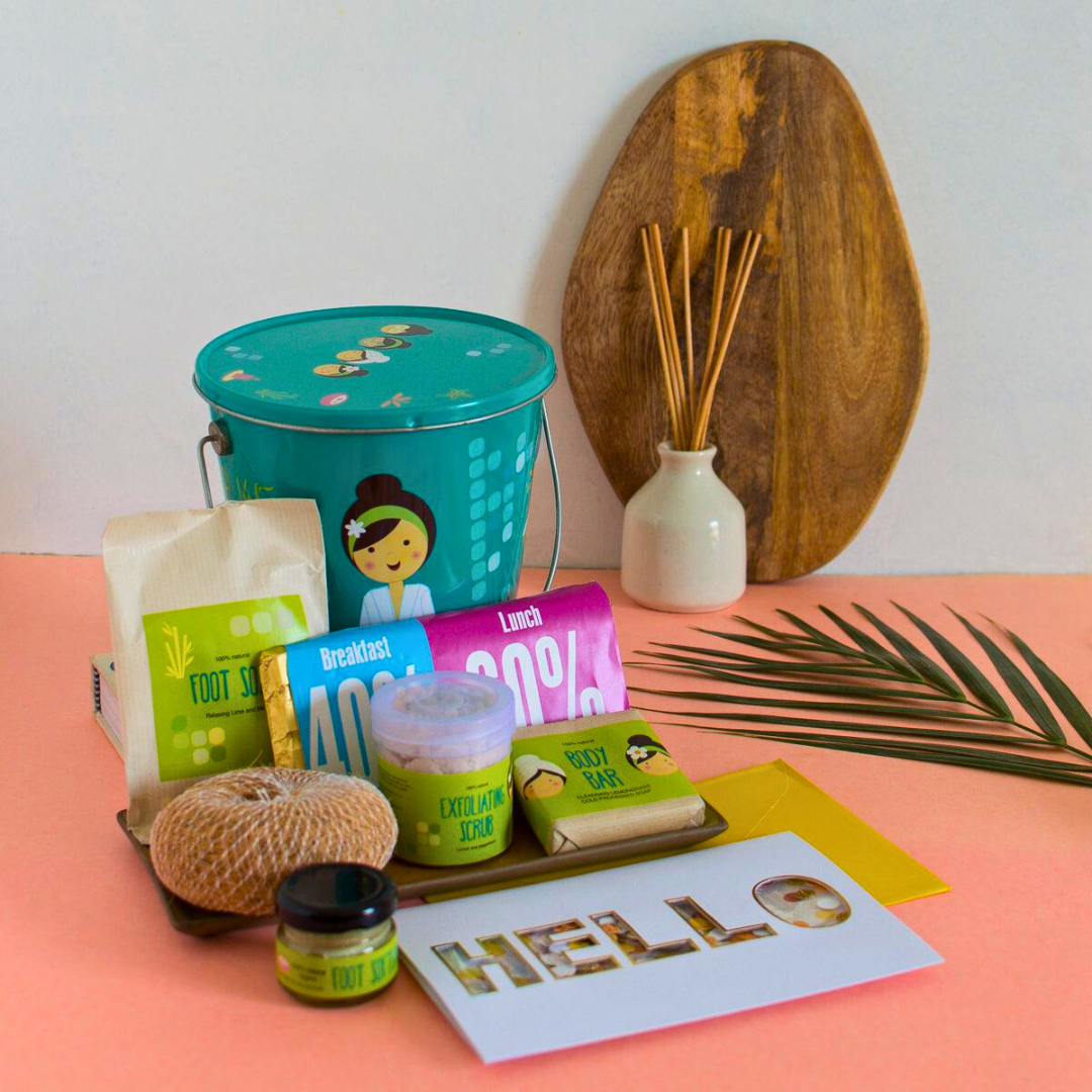 Spa gift hamper with bath essentials, scrubs and care items