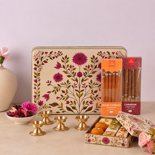 Diwali gift hamper for family with sweets, diyas and incense